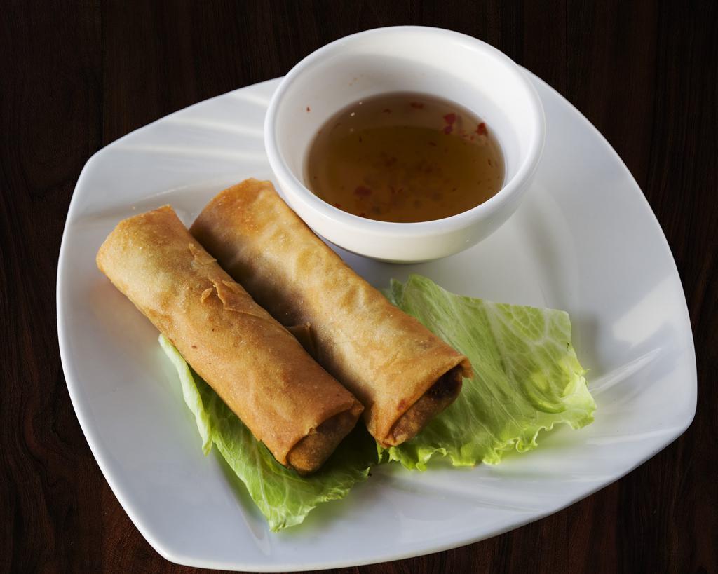 2. Deep-Fried Egg Rolls · Hot deep-fried crispy egg roll consists of ground pork, taro, carrot, potato, and thin vermicelli. Served with sweet fish sauce