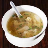 5. Wonton Soup · Ground pork and wonton dumplings steamed and garnished with pan-fried onions.