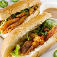 10. Vietnamese Sandwich Special · Cucumber, jalapenos, daikon, pickled carrot, and cilantro. – Protein included beef, chicken,...