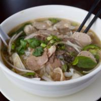 12. Beef Special Noodle Soup · Beef broth served with rice noodles and a side of fresh bean sprouts, vietnamese basil, jala...