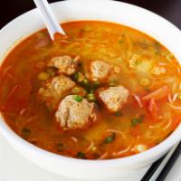 17. Crab Noodle Soup · Tomatoes broth served with crab meat ball, tofu, and thin vermicelli.