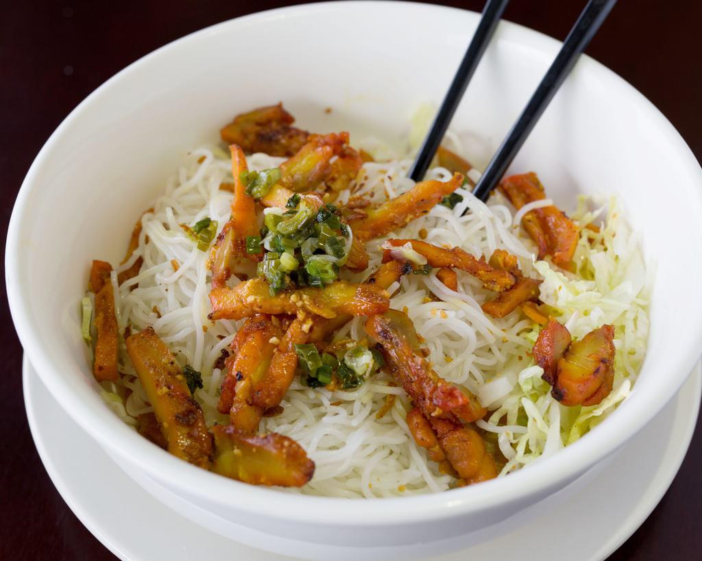 18. Rice Noodle Bowl · Rice vermicelli served with lettuce, bean sprouts, pickled carrots, scallion, peanut, and a side of sweet fish sauce.