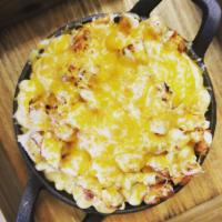 Homemade Mac and Cheese · The perfect combination of creamy and cheesy 4 cheese mac and cheese topped with crushed pot...