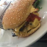 America Burger · Angus beef (Americanized) with American cheese, house ketchup, organic heritage mix lettuce,...