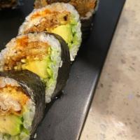 R13. Spider Roll · Inside: Soft shell crab and cucumber. Outside: Avocado, masago and mayo. Sauce: Eel sauce.