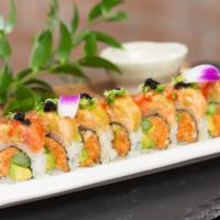 R22. Triple Hot Roll · Inside: Spicy salmon, avocado and asparagus. Outside: Spicy tuna, spicy yellowtail, scallion...