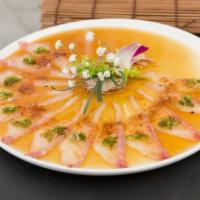 U7. Usutsukuri · Slices white fish, bonito flakes, scallions and shichimi powder. Served with ponzu sauce.
