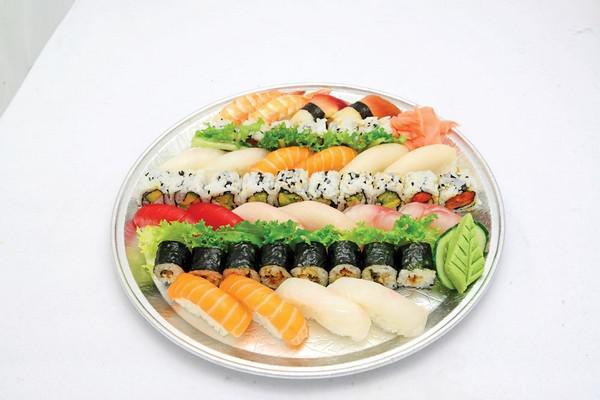 P9. Silver Sushi Party Tray · 20 pieces assorted sushi  and 24 pieces roll ( Includes : 8 pieces California roll, 8 pieces Eel Avocado roll and 8 pieces Spicy roll.)
