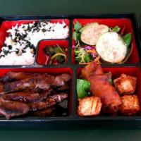 Korean Beef (Bulgogi) Bento · Korean marinated beef, eggroll and shrimp shumai. Includes salad with Japanese ginger dressi...