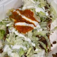 Huarache · choice of meat(asada, pastor,pollo,carnitas,lengua,cabeza)