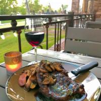 Grilled Ribeye · 14oz hand cut Ribeye grilled to order, served with rosemary fingerling potatoes, wild mushro...