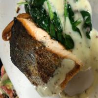 Pan Seared Salmon  · 6oz Scottish salmon fillet served with crispy herbed fingerling potatoes, garlic spinach and...