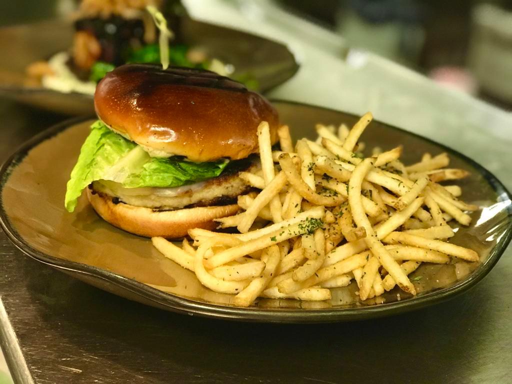 Crab and Whitefish Burger · Served with a brioche roll, provolone cheese, lettuce, tomato, red onion and chipotle tartar sauce