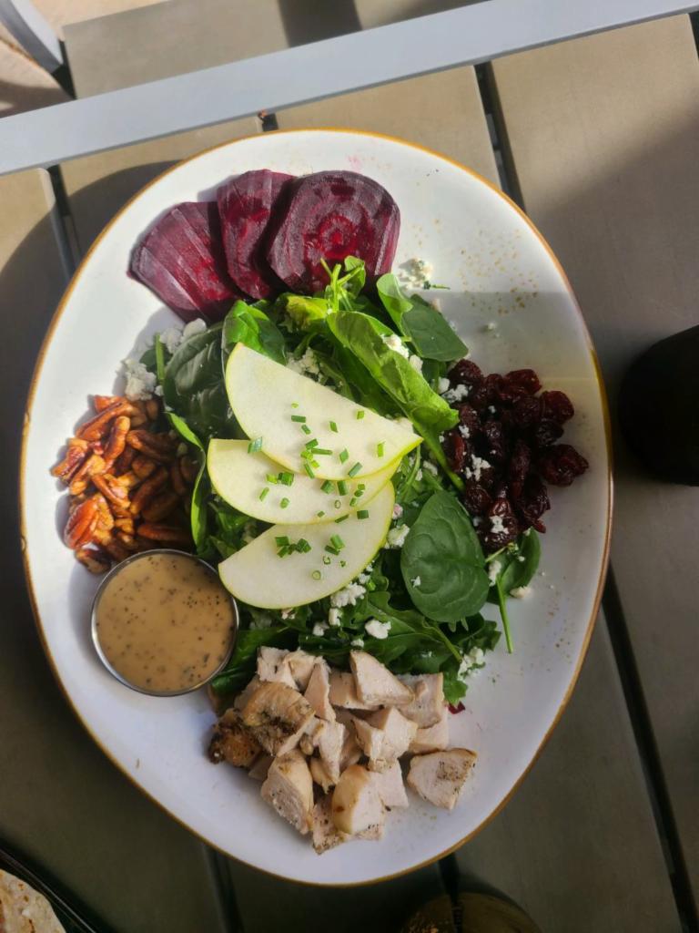 Spinach & Arugula Salad  · Grilled chicken, tart green apples, roasted beets, candied pecans, dried cherries, bleu cheese, white balsamic vinaigrette