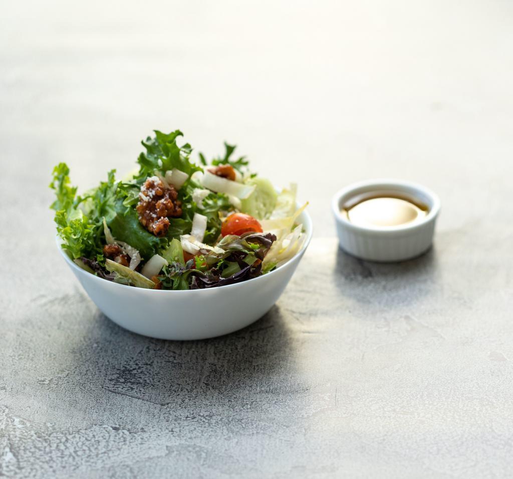 Misto Salad · Mixed greens, endive, cherry tomatoes, caramelized walnuts and cucumbers with our house-made balsamic vinaigrette.