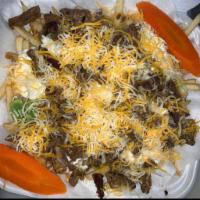Carne Asada with French Fries  · 
 Guacamole, sour cream, and cheese.