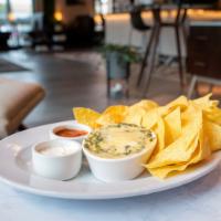 Spinach Dip · artichoke, monterey and parmesan cheese, corn chips, fire roasted salsa and sour cream