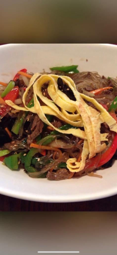 JapChae · Stir-fried glass noodle. Sweet potato clear noodles. Stir-fried with beef, vegetables and eggs.