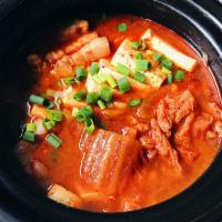 Kimchi JjiGae · Kimchi and pork stew with tofu and vegetables. Spicy.