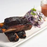Hill Country Spare Ribs Dinner · Dry rubbed and pit smoked, blue cheese slaw Central TX BBQ sauce.
