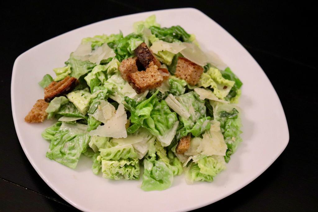 Classic Caesar Salad Dinner · Chopped romaine, shaved Parmesan and croutons.