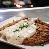 Chicken Fried Steak Lunch · Mashed potatoes, market vegetables and cracked pepper cream gravy.