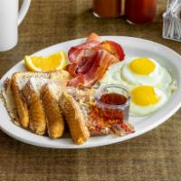 French Toast Combo · Served with 2 eggs, choice of ham, bacon, sausage patty or links.