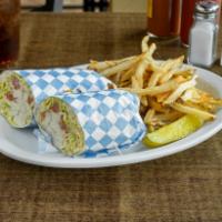 Southwest Chicken Wrap · Pepper jack, tomato, lettuce, and chipotle aioli wrapped in a flour tortilla.