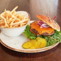 Traditional Burger · CAB burger patty cheddar, lettuce, tomato, red onion, pickles.