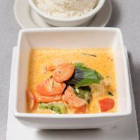 28. Panang Curry · Served with carrots, onions and bell pepper. Spicy.
