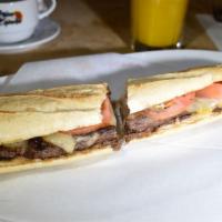 Pepito · (Skirt Steak,Muenster Cheese and Tomato Sandwich
and Fried Potato Chip)