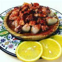 Pulpo a la Gallega · Octopus with boil potato, paprika and olive oil.