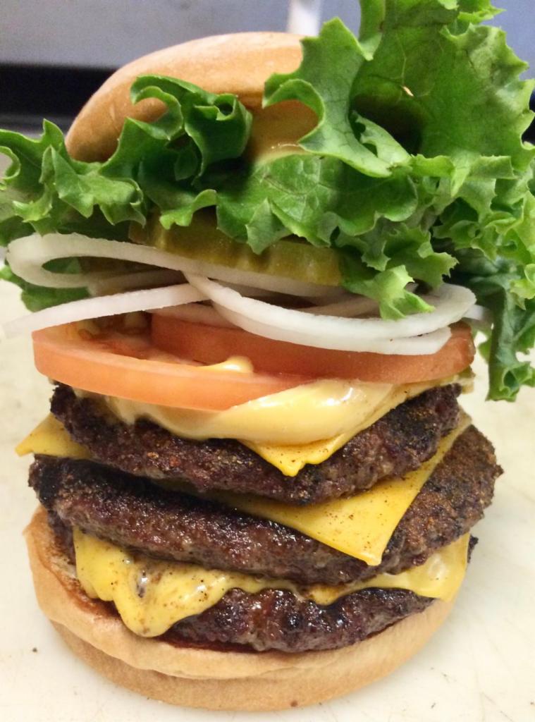 Triple Stacked (1lb.) · 3 Big Patties with Teddy's special sauce, green leaf lettuce, tomatoes, onions and pickles.