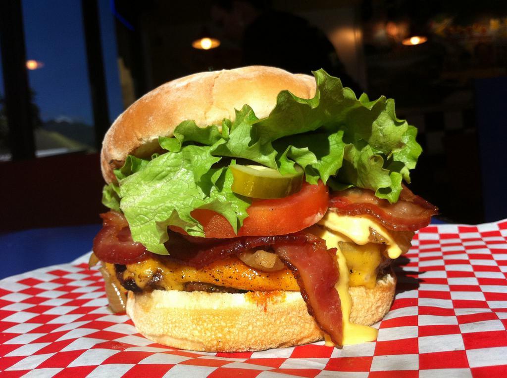 Bacon Me Crazy Burger · Double bacon, grilled onions and double American cheese. Also Comes with Teddy's special sauce, green leaf lettuce, tomatoes, onions and pickles.