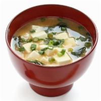 A9. Miso Soup · Miso boiling with tofu, seaweed, and green onion.