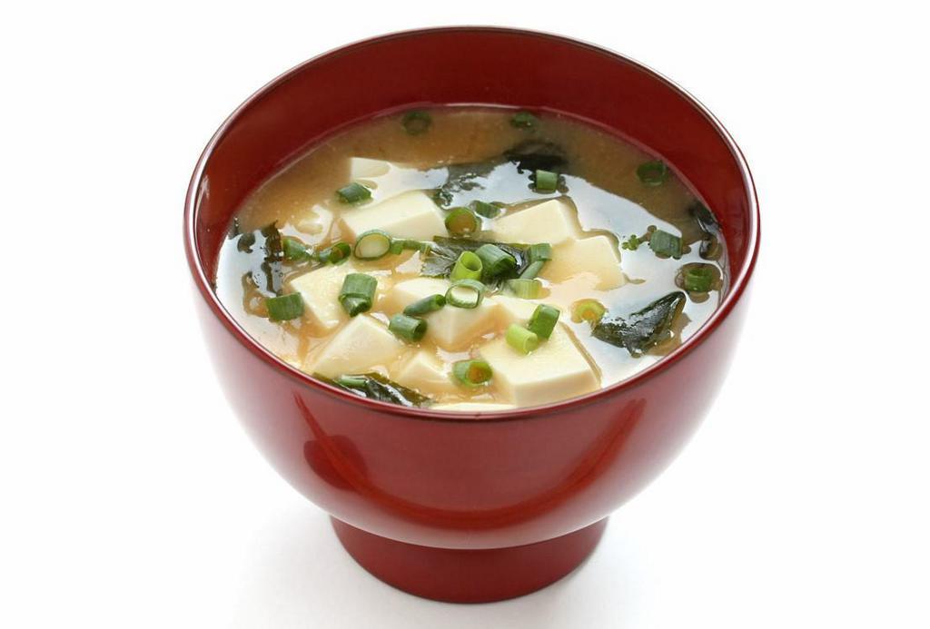 A9. Miso Soup · Miso boiling with tofu, seaweed, and green onion.