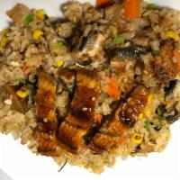 E1. Eel Fried Rice · Stir-fried with eel, carrot, baby corn, peas, egg and green onion.