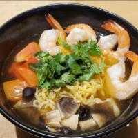 Tom Yum Ramen  · Thai lemongrass and lime juice soup with Japanese ramen noodle, mushroom, tomato and cilantro.