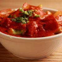 Paneer Tikka Masala · Prepared in a spiced curry sauce.