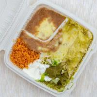 2 Enchiladas Plate · Your choice of meat is served with rice, refried beans, guacamole, lettuce, sour cream and g...