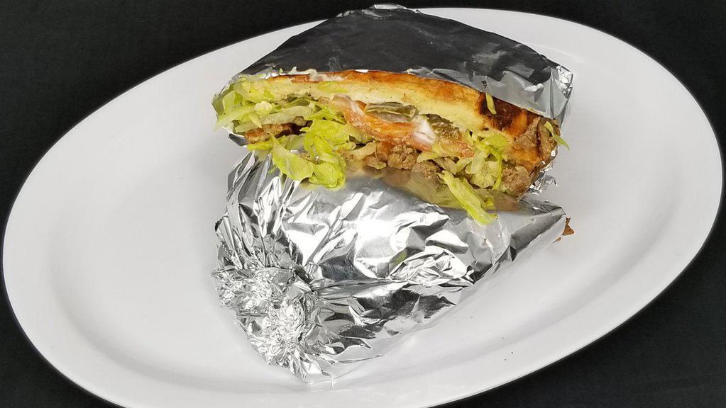 Torta · Choice of meat, cheese, avocado, mayonnaise, lettuce, tomatoes, onion and jalapeños.
