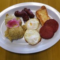 Mangu Golpes with 4 Accompaniments · Smashed green plantains with 4 accompaniments.