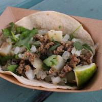 #1. Picadillo Taco · Spicy ground beef and potatoes with onions and cilantro. Served on a corn tortilla. Spicy.