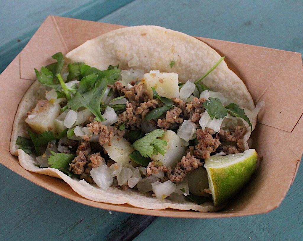 #1. Picadillo Taco · Spicy ground beef and potatoes with onions and cilantro. Served on a corn tortilla. Spicy.