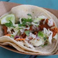 #10 Fried Chicken Taco · Hand battered chicken breast with jalapeno ranch, slaw and cilantro.