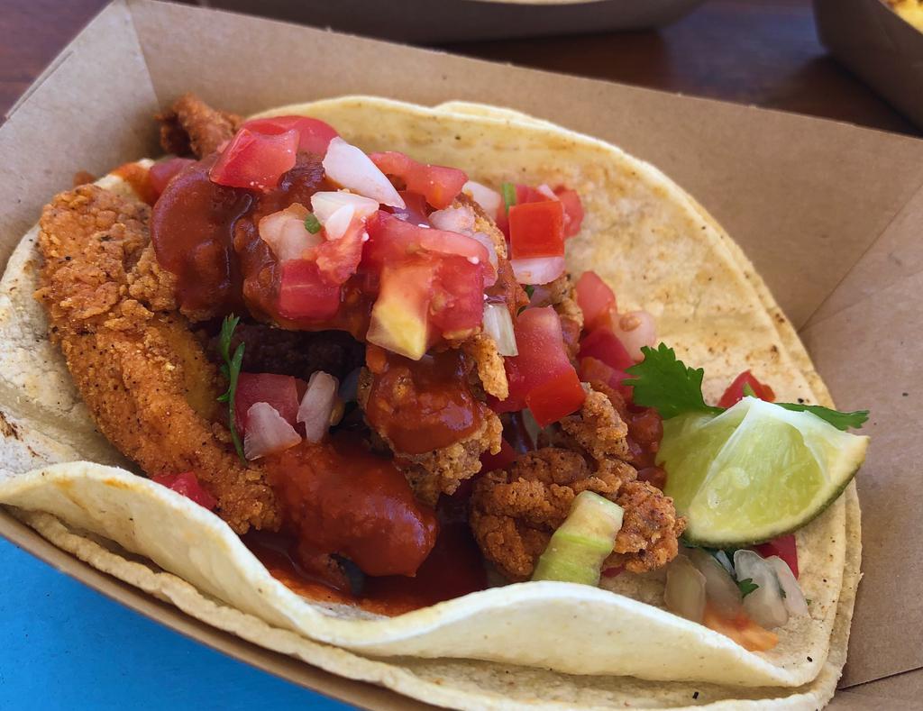 Team Fave Fried Chicken Taco · Topped with our awesome queso, bacon and pico de gallo.
