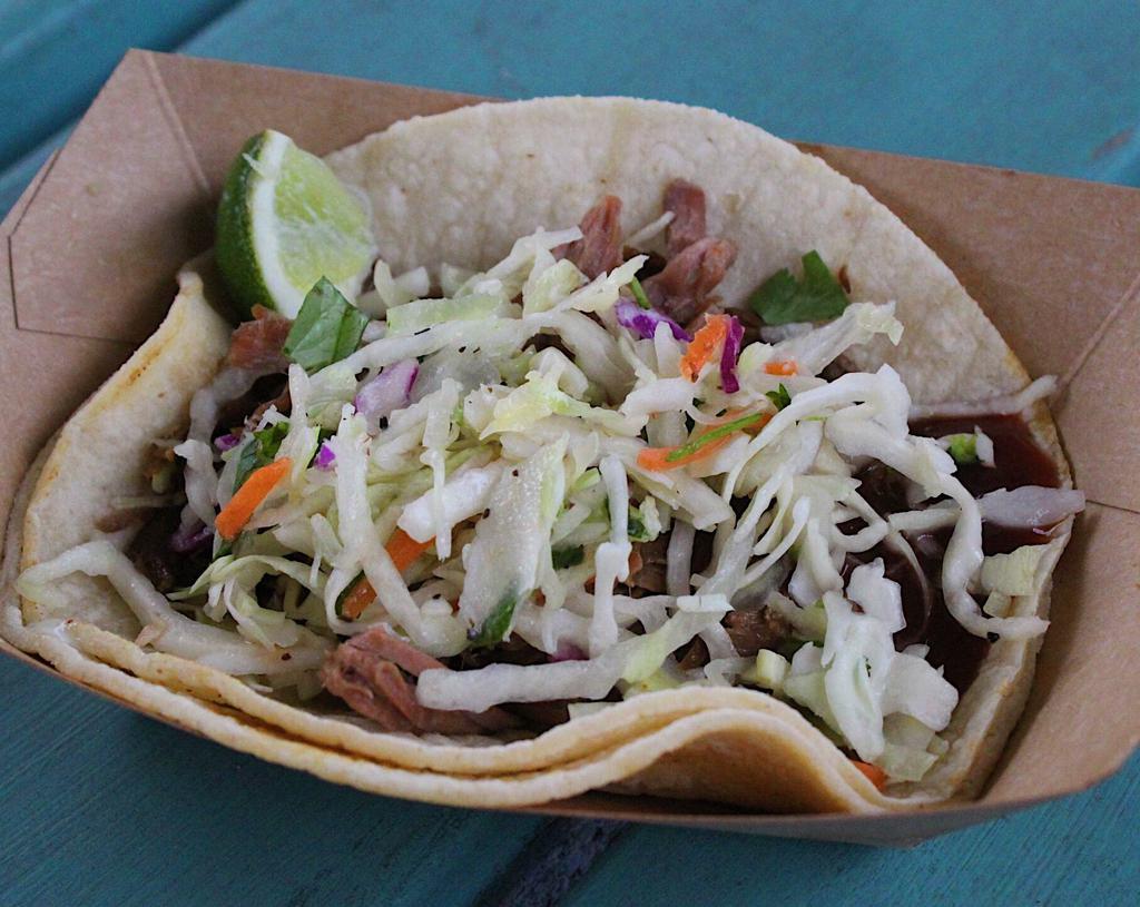 #11. BBQ Brisket Taco · Brisket with BBQ sauce and slaw. Served on a corn tortilla.