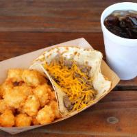 Kids Texican Taco Meal · Ground beef & cheddar on a flour tortilla.  Served with Tots and a Drink