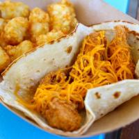 Kids Fried Chicken Taco Meal · Fried chicken & cheddar on a flour tortilla.  Served with Tots and a Drink