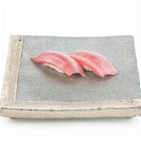 Nigiri Akami Bluefin · Sushi laid top of rice.